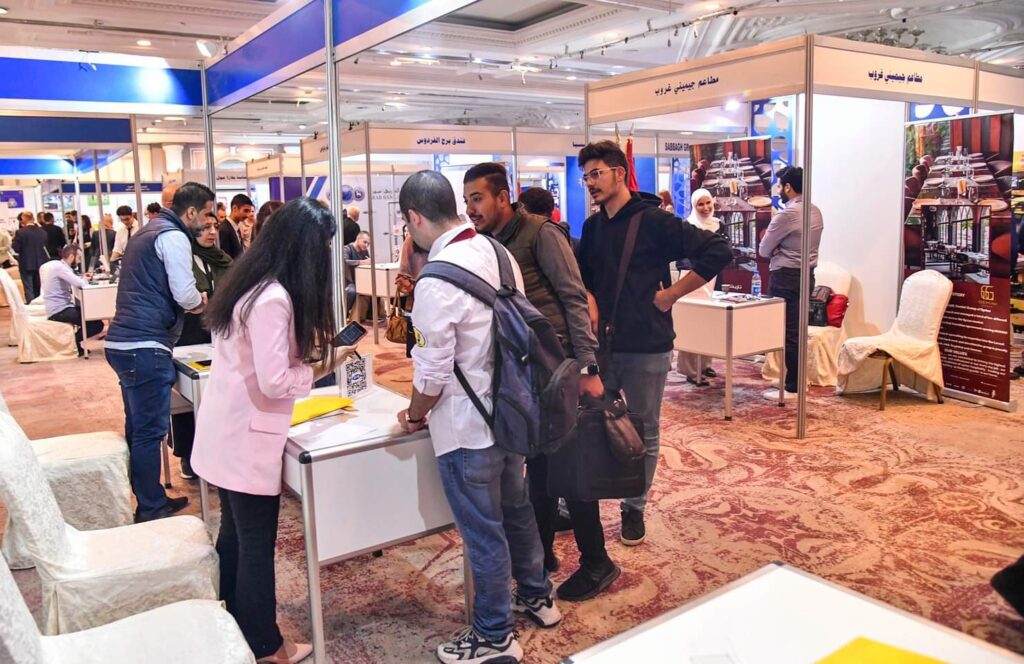Hundreds of job seekers and scores of employers meet face to face in a forum in Damascus
